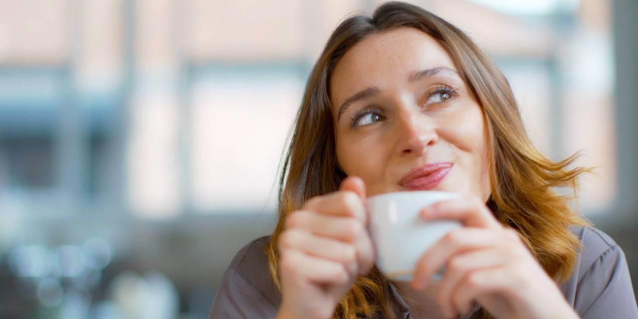 Woman enjoy her hot drink